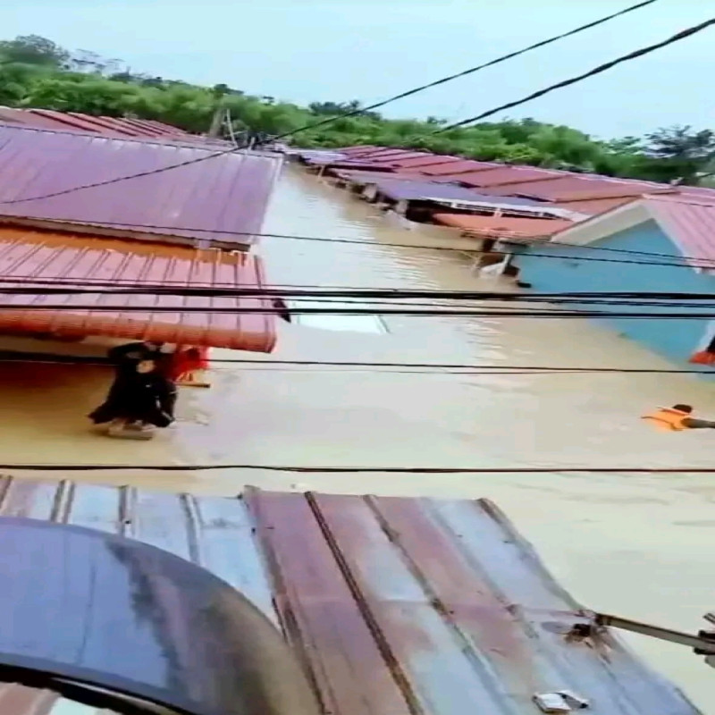 Bantu korban banjir di medan